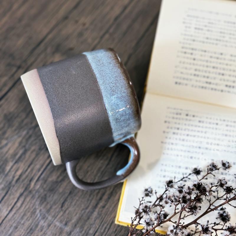 Handcrafted large porcelain TOKA mug in black with a large handle. Made in Japan.