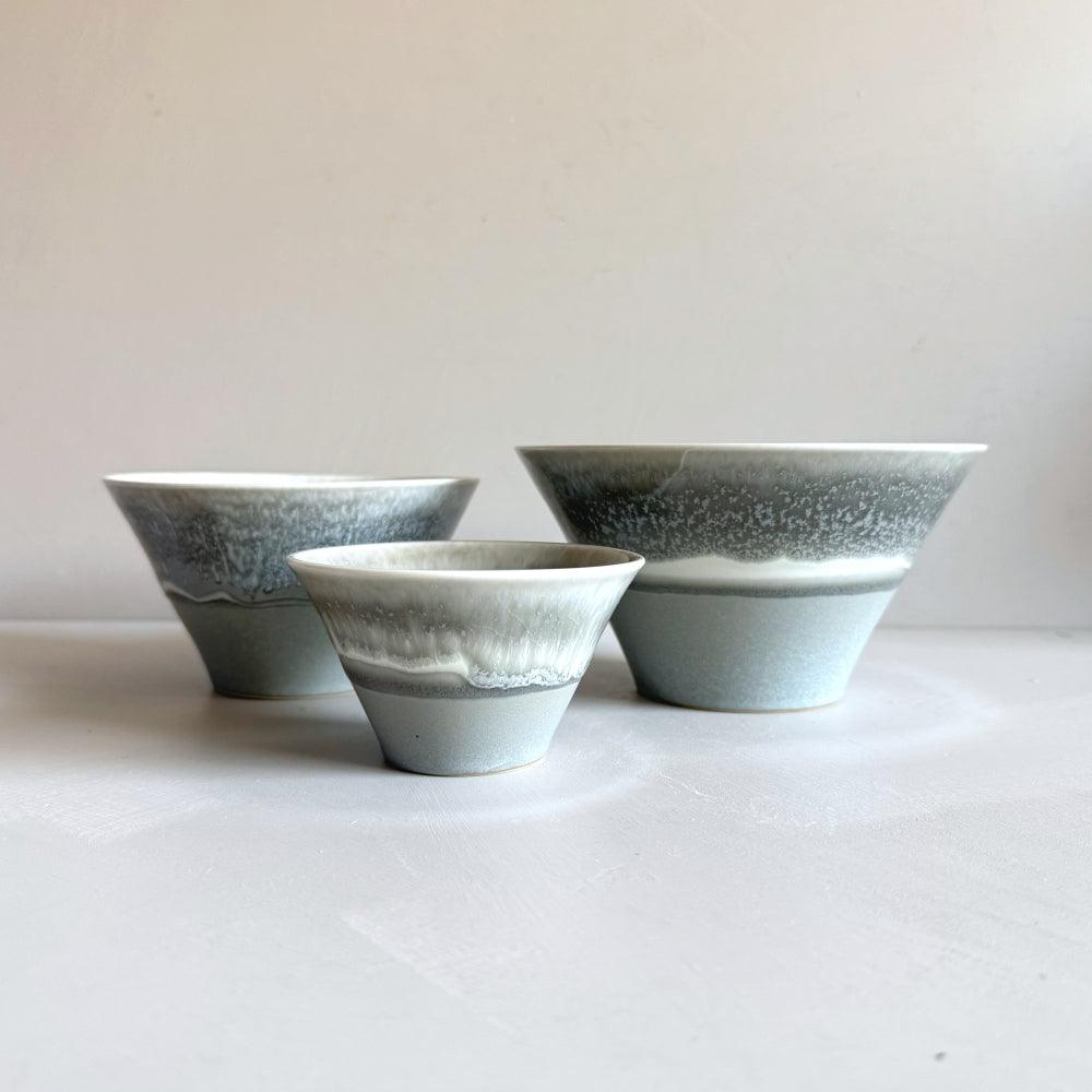 Icicle medium bowl: Crafted by Sinkogama in Mino, Gifu, Japan. Unique glaze captures nature's beauty. Elevate your space with this handcrafted masterpiece.