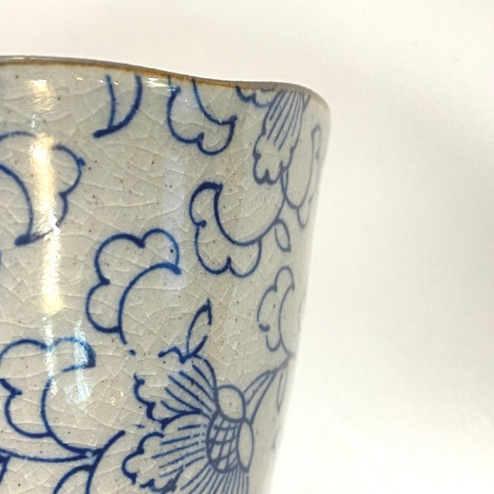Japanese tea cup in blue floral pattern. Mino ware, made in Japan. Available at Toka Ceramics.