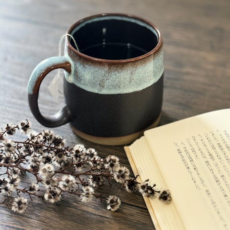 Handcrafted large porcelain TOKA mug in black with a large handle. Made in Japan. 