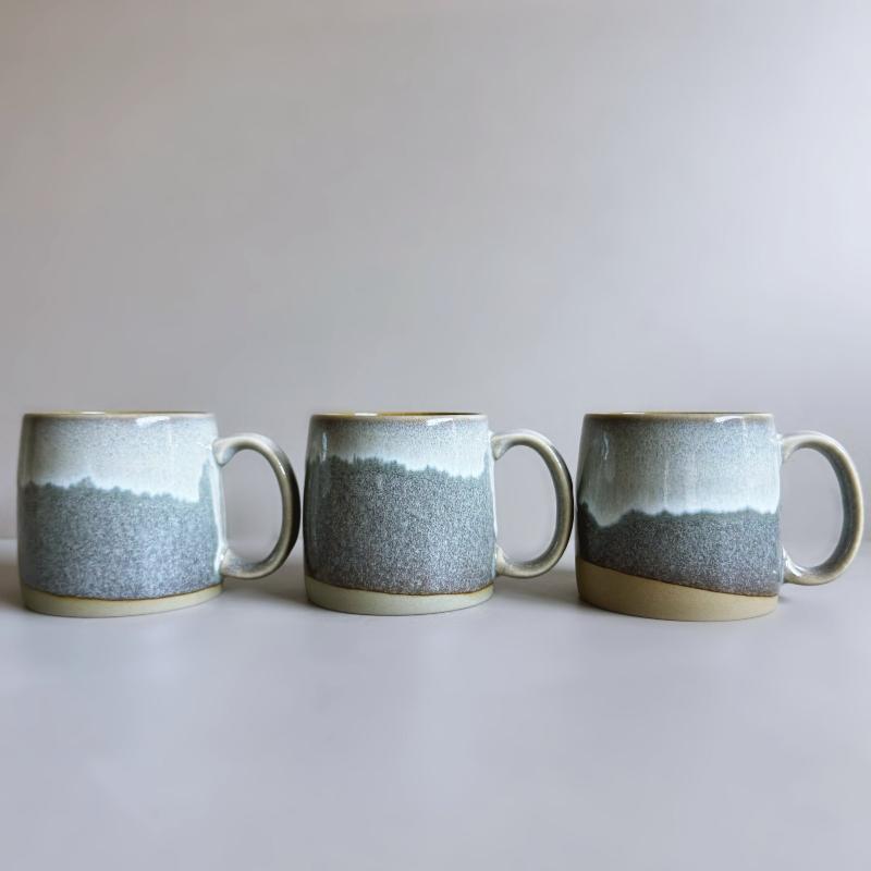 Handcrafted large Japanese mug in grey glaze with a large handle. Made in Gifu prefecture, Japan.