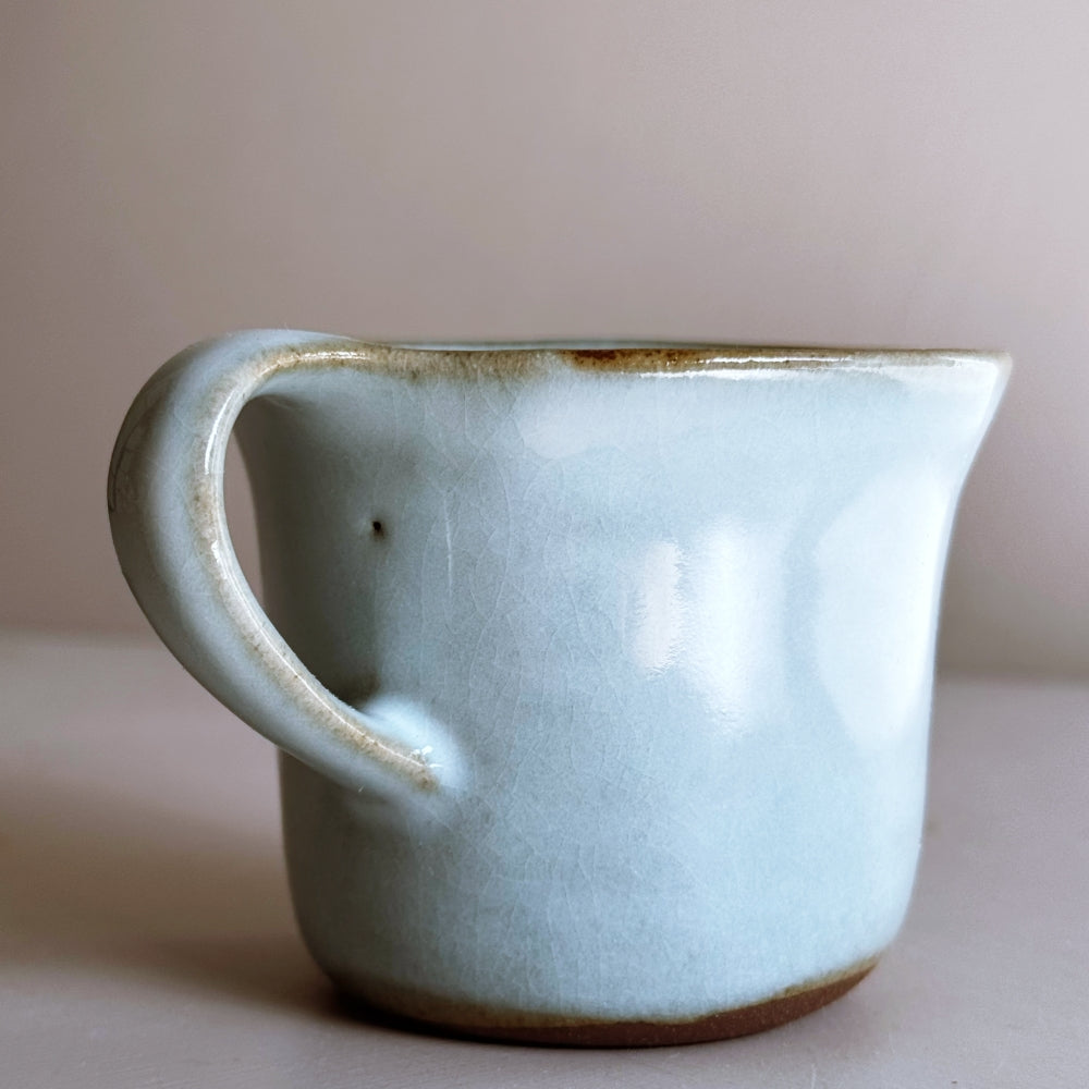 Japanese porcelain cup and saucer set in sky blue glaze. Made in Japan, Mino Ware. Available at Toka Ceramics.