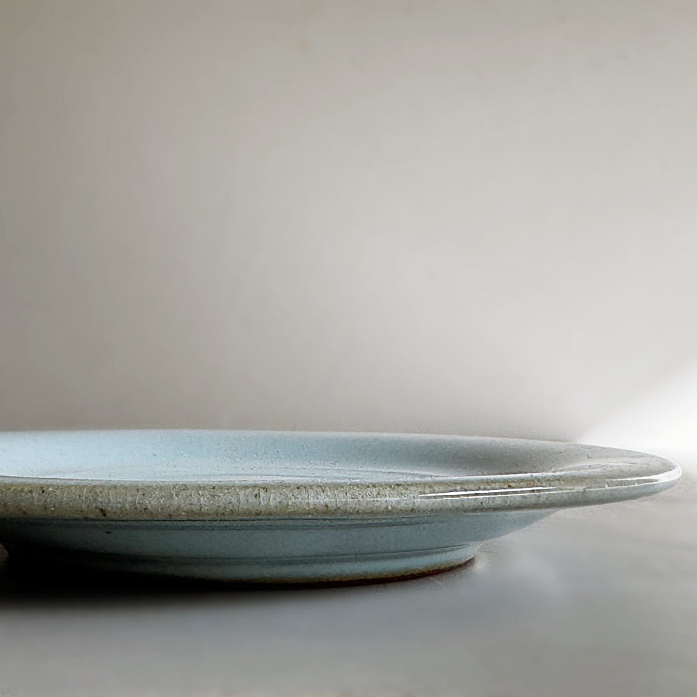 Japanese porcelain cup and saucer set in sky blue glaze. Made in Japan, Mino Ware. Available at Toka Ceramics.