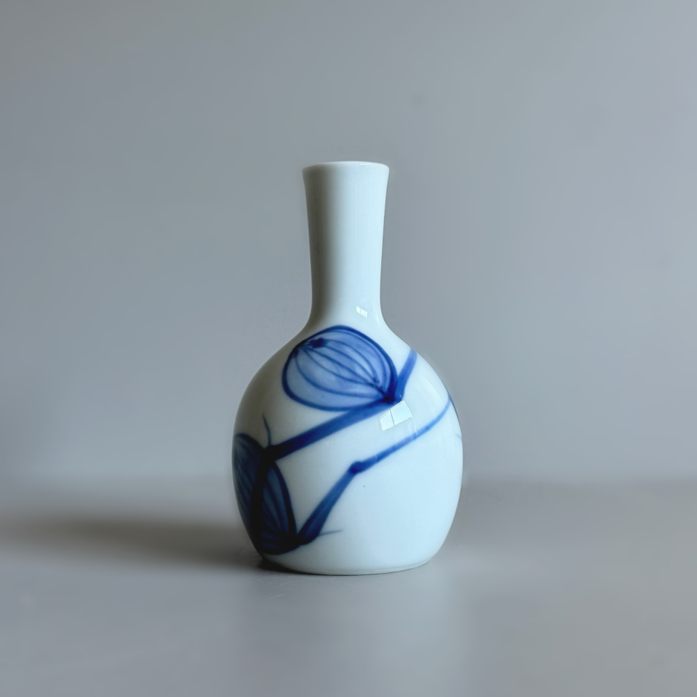 Japanese porcelain stem vase with Hoozuki, Japanese lantern drawing. Mino ware. Available at Toka Ceramics.
