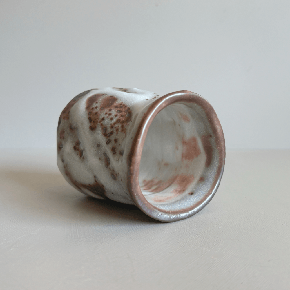 Japanese handcrafted tea cup by Takeharu Kobayashi. Mino ware, authentic Japanese pottery. Available at Toka Ceramics.