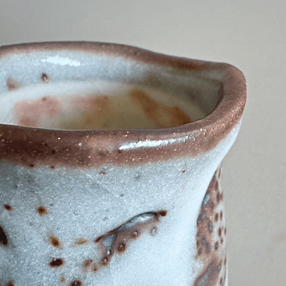 Japanese handcrafted tea cup by Takeharu Kobayashi. Mino ware, authentic Japanese pottery. Available at Toka Ceramics.