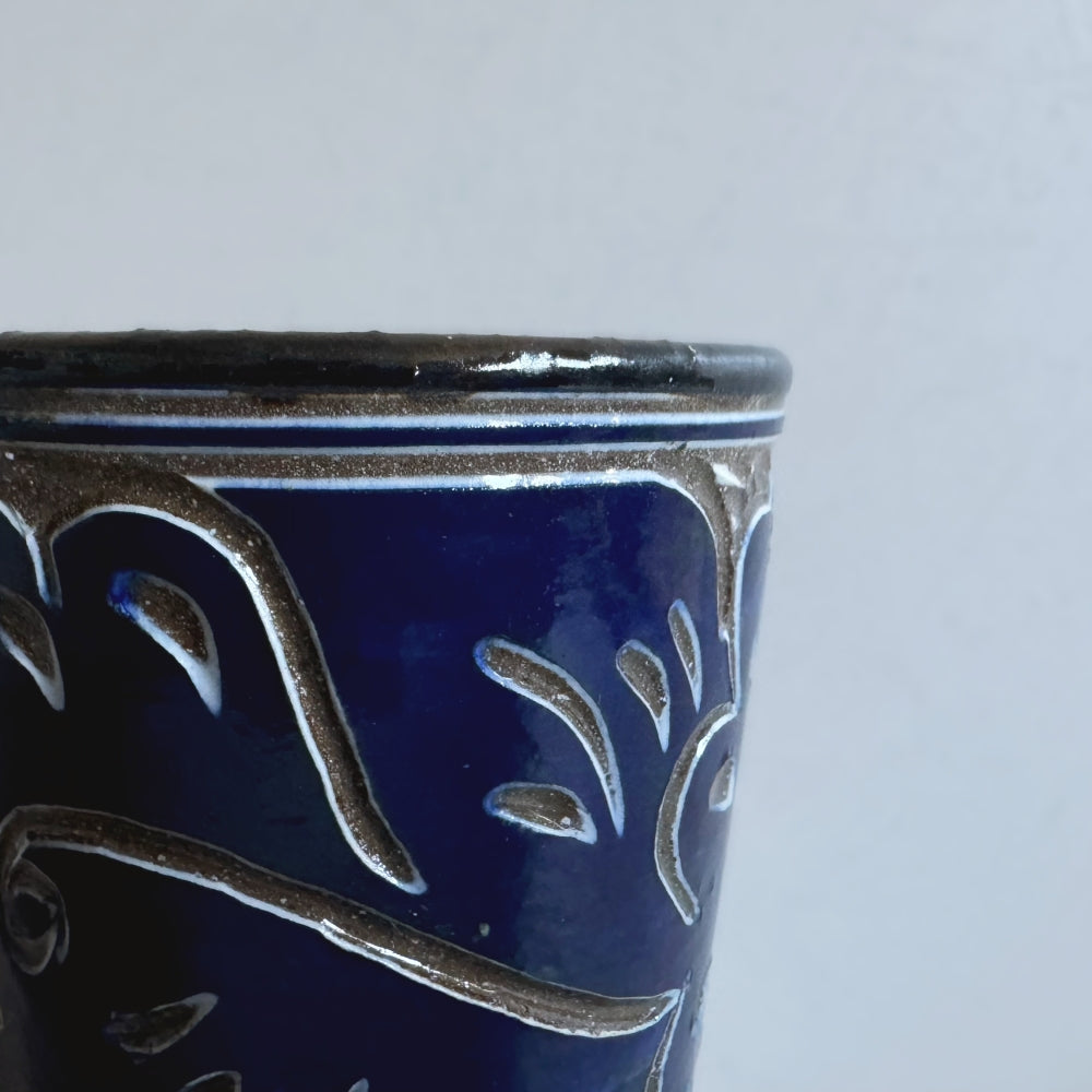 Japanese ceramic tumbler with carved Karakusa (Arabesque) pattern, handcrafted by Yachimun Yonamine in Japan. Available at Toka Ceramics.