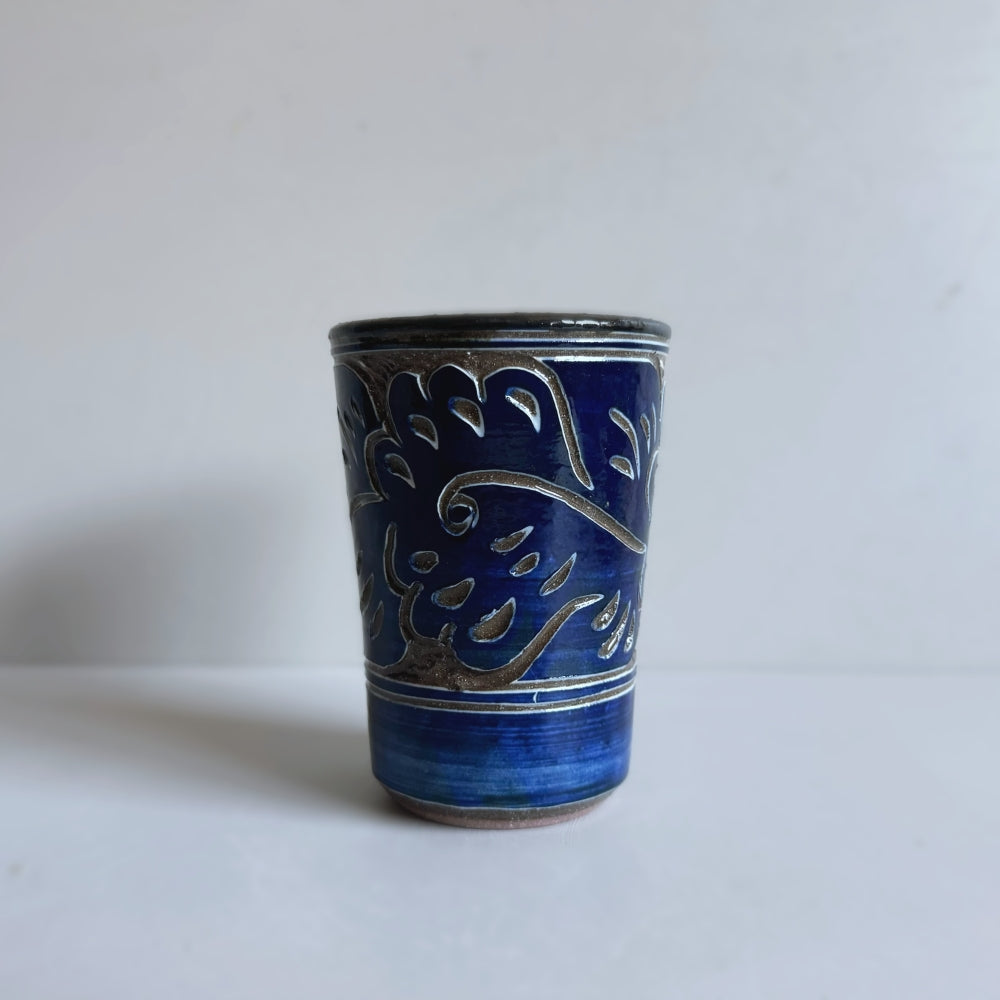 Japanese ceramic tumbler with carved Karakusa (Arabesque) pattern, handcrafted by Yachimun Yonamine in Japan. Available at Toka Ceramics.