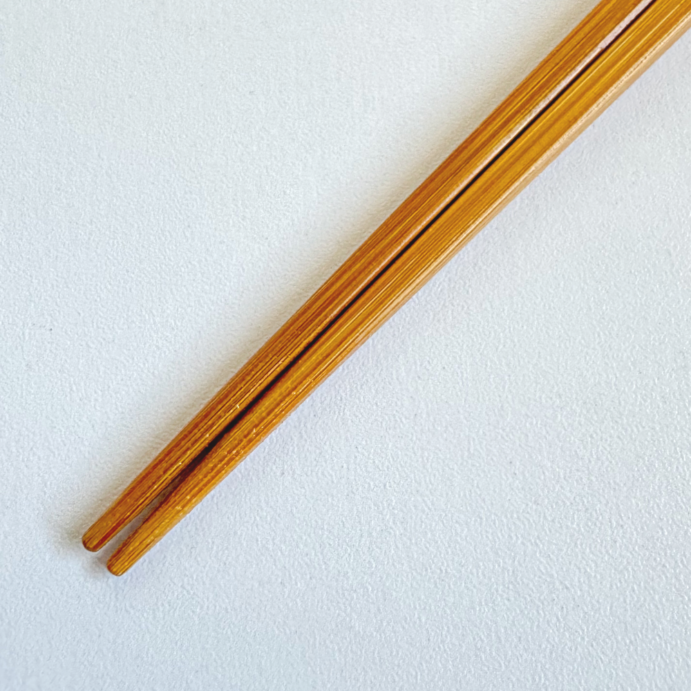 Yamachiku bamboo chopsticks in mustard colour. Handcrafted in Kumamoto, Japan. Available at Toka Ceramics.