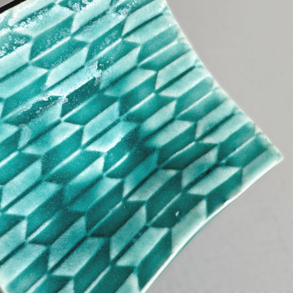 Japanese handcrafted mini curved plate, Mame zara in teal glaze colour by Shoyo Gama. Available at Toka Ceramics.