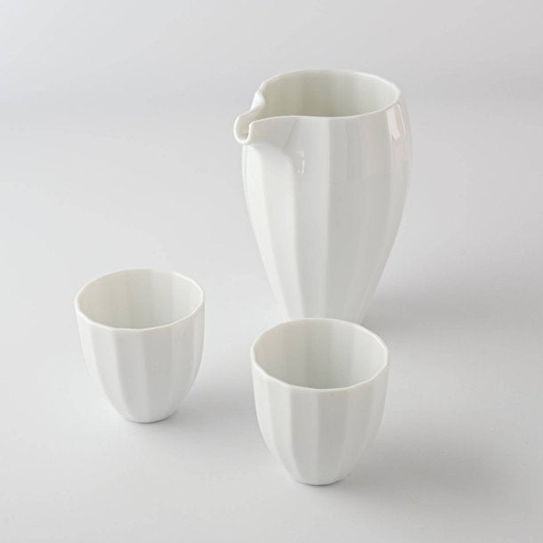Miyama white porcelain sake set, comes with 1 sake pourer and 2 cups in a wooden gift box. Made in Gifu prefecture, Japan. Mino ware. Available at Toka Ceramics.