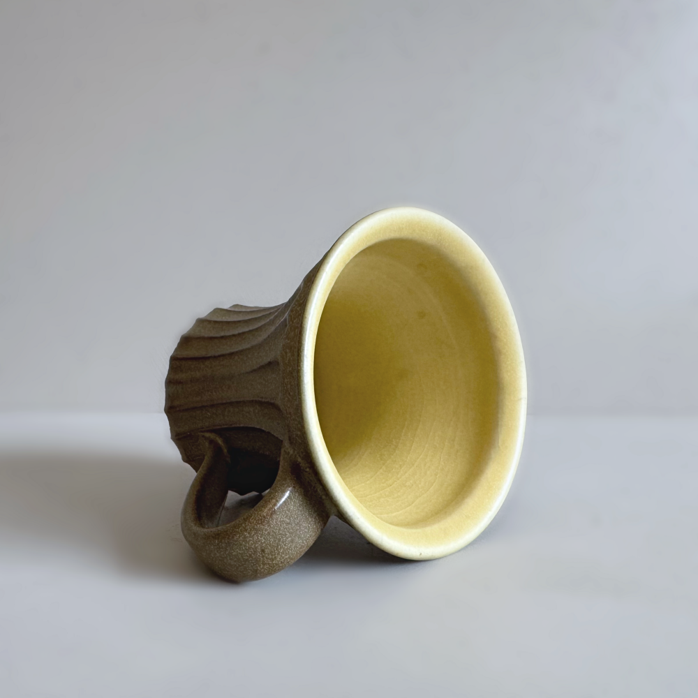 Japanese handcrafted pottery mug with shinogi pattern by Shoyo Gama. Available at Toka Ceramics.