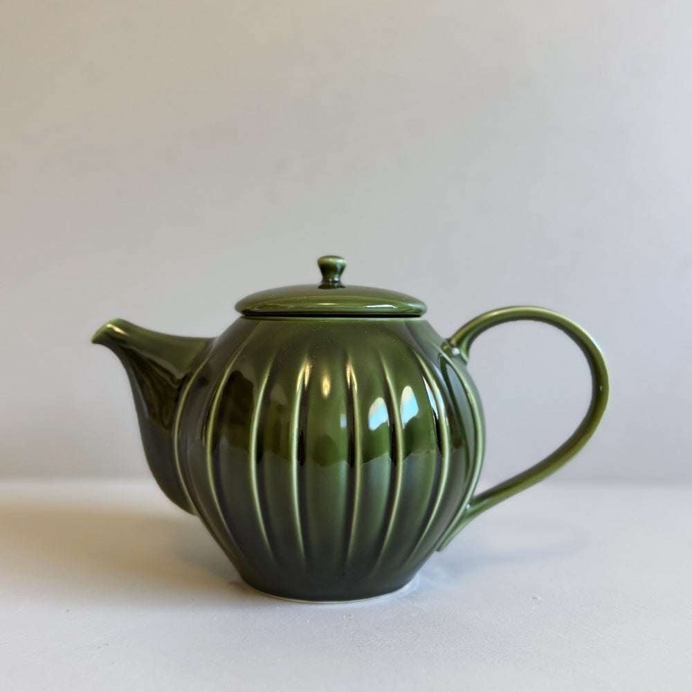 Shinogi Teapot in oribe green glaze, 750ml capacity. Mino ware, made in Japan. Available at Toka Ceramics.