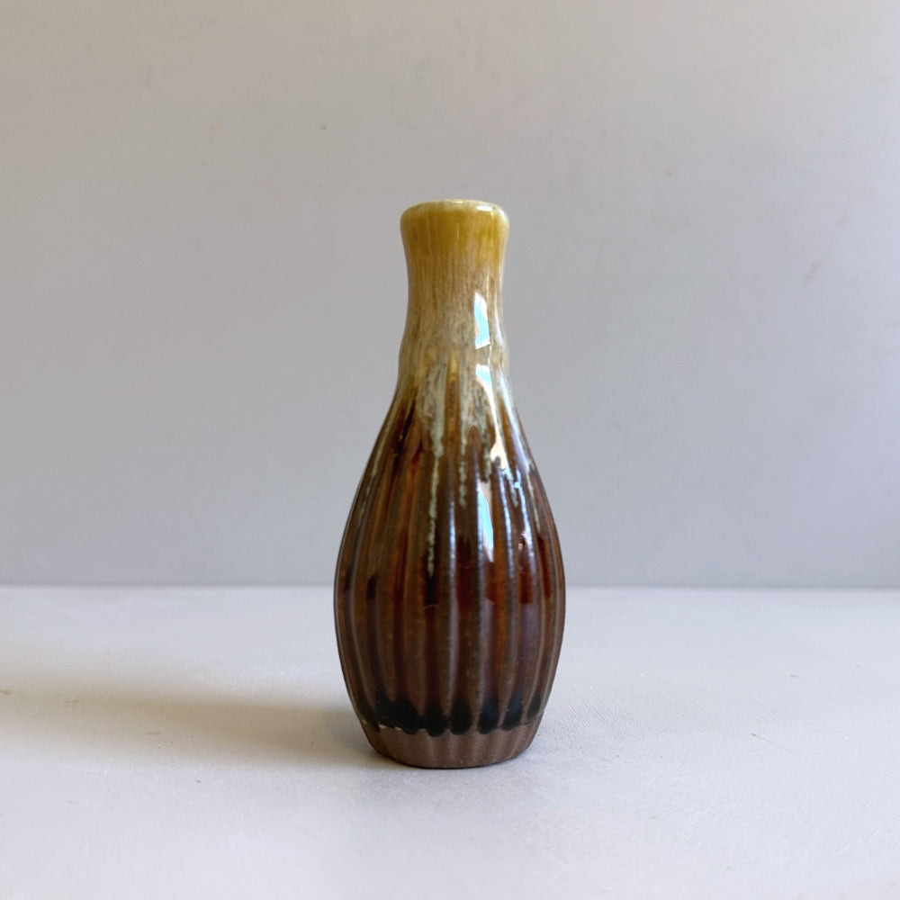 Small pottery stem vase in Ame glaze. Handcrafted in Hyogo, Japan. Tamba Ware. Available at Toka Ceramics.