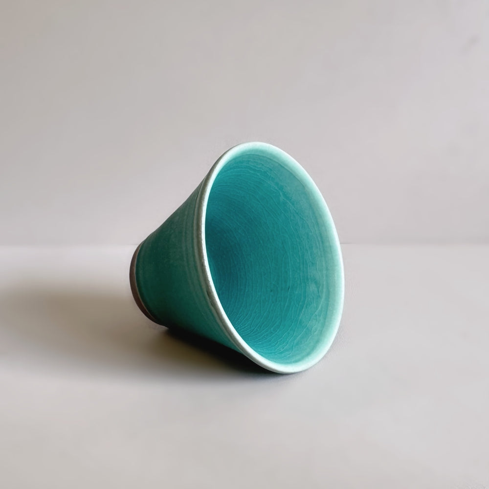 Japanese handcrafted pottery tea cup by Shoyo gama. Available at Toka Ceramics.