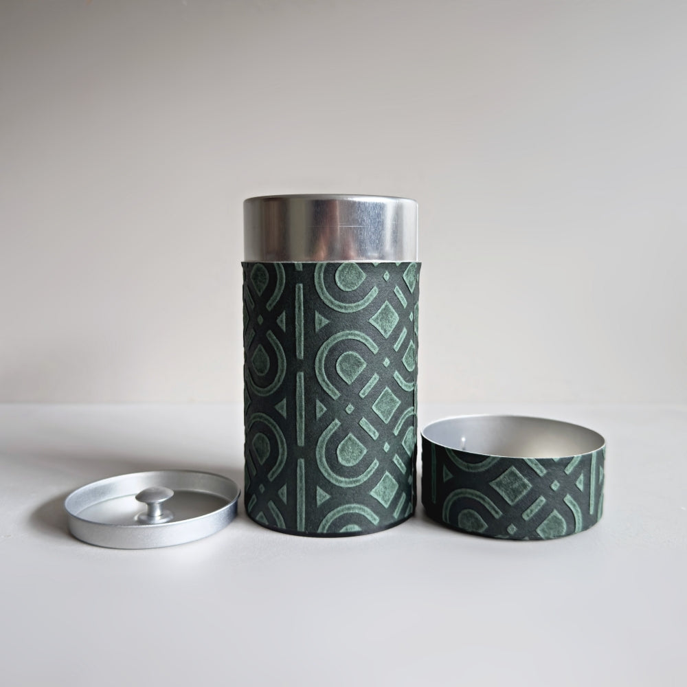 Yamatsugi Washi Studio - Ukigami tea canister in dark green. Medium size. Available at Toka Ceramics.