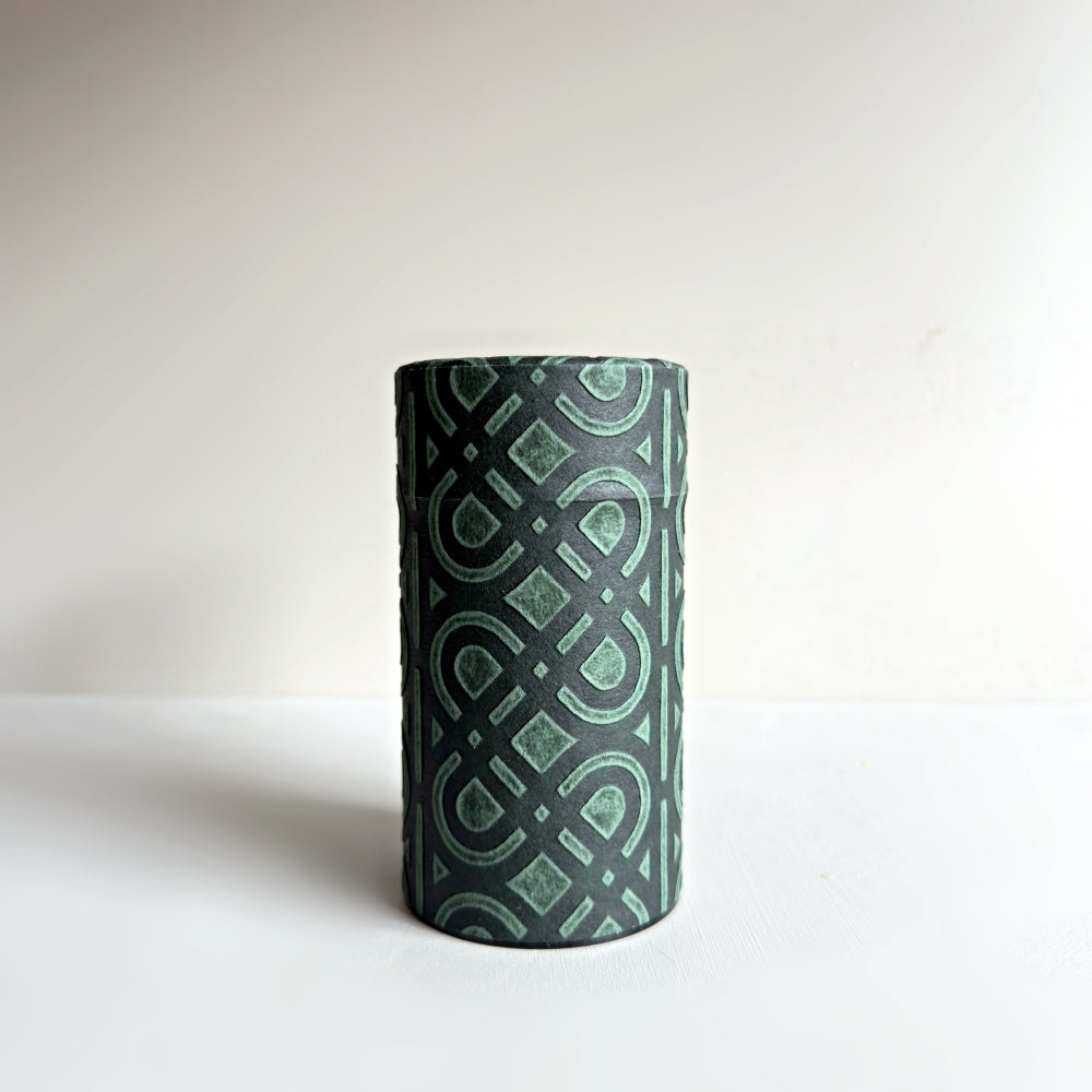 Yamatsugi Washi Studio - Ukigami tea canister in dark green. Medium size. Available at Toka Ceramics.