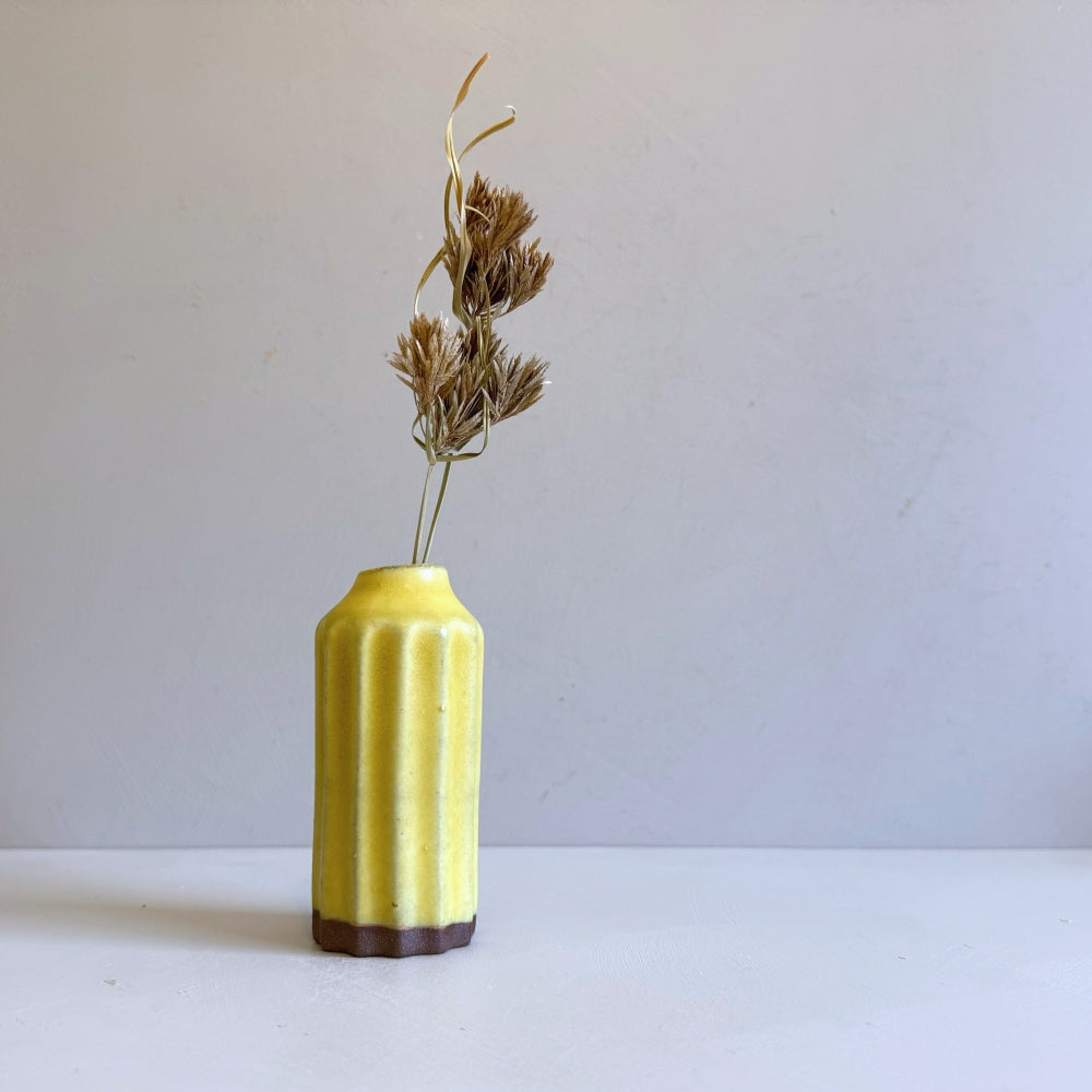 Small pottery stem vase in soft yellow glaze. Handcrafted in Japan, Tambwa Ware. Available at Toka Ceramics.