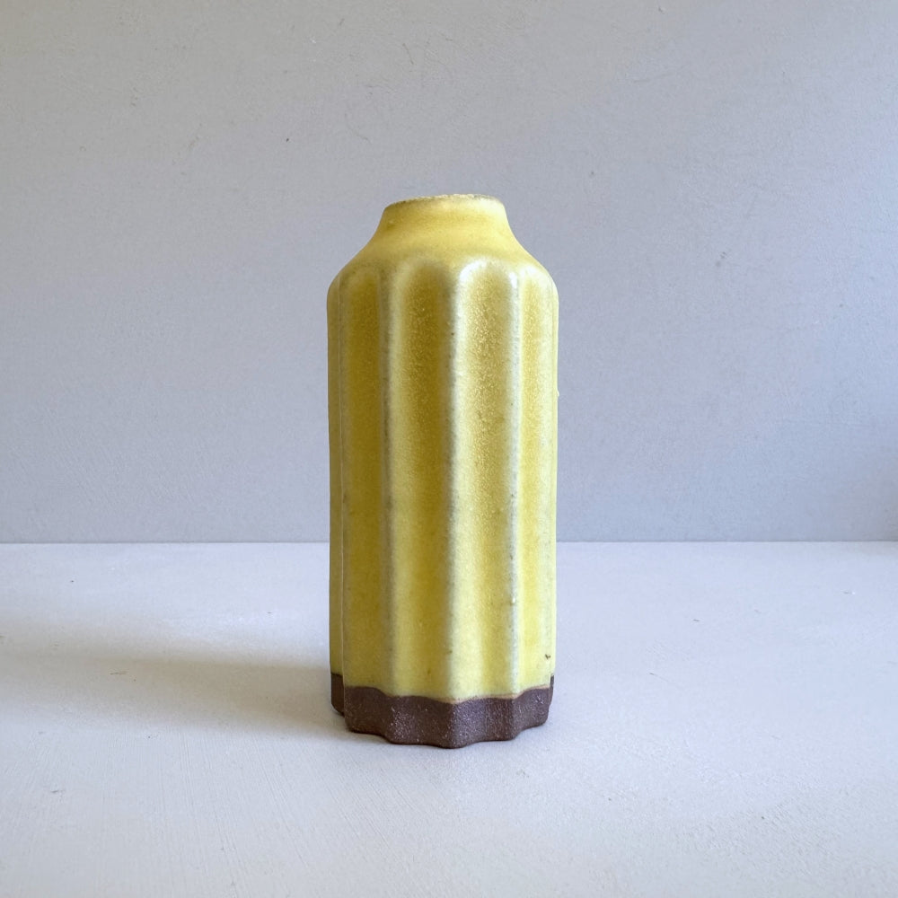 Small pottery stem vase in soft yellow glaze. Handcrafted in Japan, Tambwa Ware. Available at Toka Ceramics.