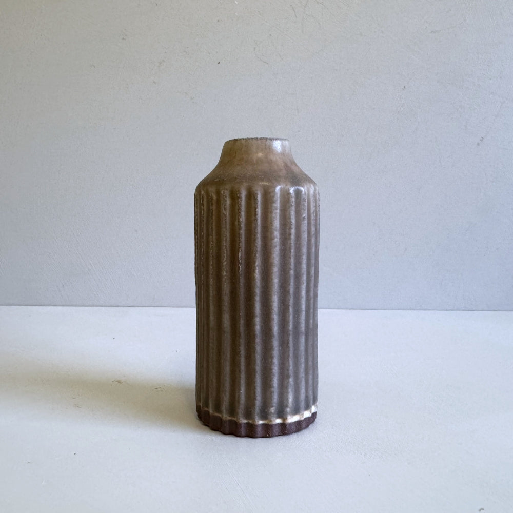 Small pottery stem vase in chestnut brown glaze. Handcrafted in Hyogo, Japan. Available at Toka Ceramics.
