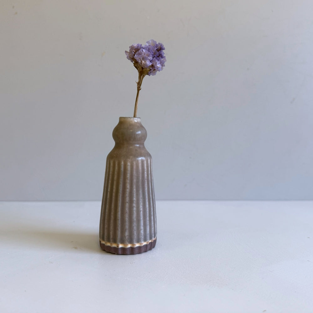 Small potter stem vase in chestnut brown glaze. Handcrafted in Hyogo, Japan. Available at Toka Ceramics.