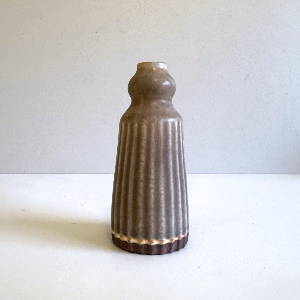 Small potter stem vase in chestnut brown glaze. Handcrafted in Hyogo, Japan. Available at Toka Ceramics.