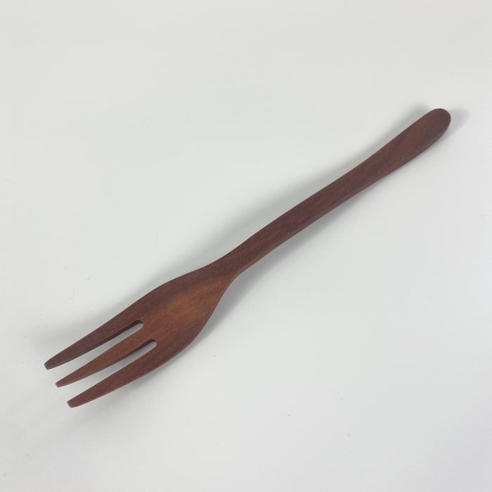 Natural wooden simple table fork from Toka Ceramics.